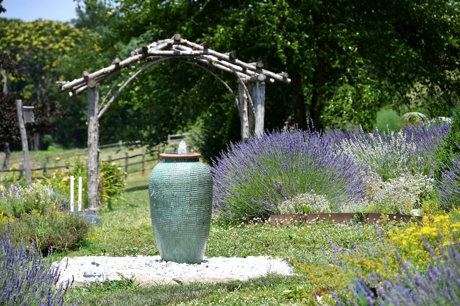 a-fountain-water-feature-at-a-lavender-farm-with-c-2021-09-03-23-26-39-utc